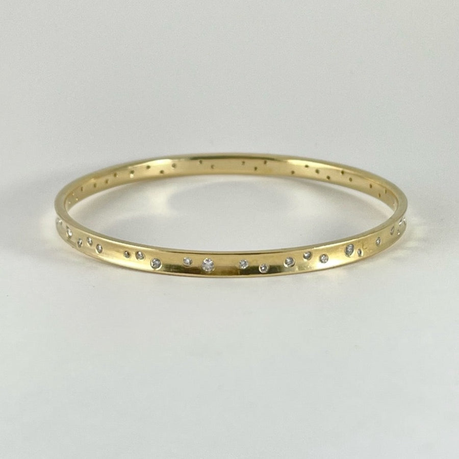 Scattered White Diamond and yellow Gold Bangle
